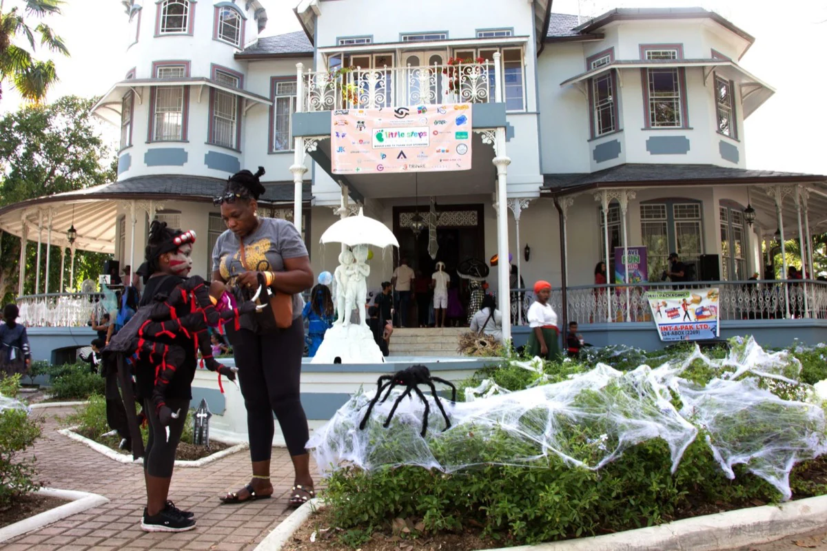 Families arriving at the decorated Little Steps Caribbean venue