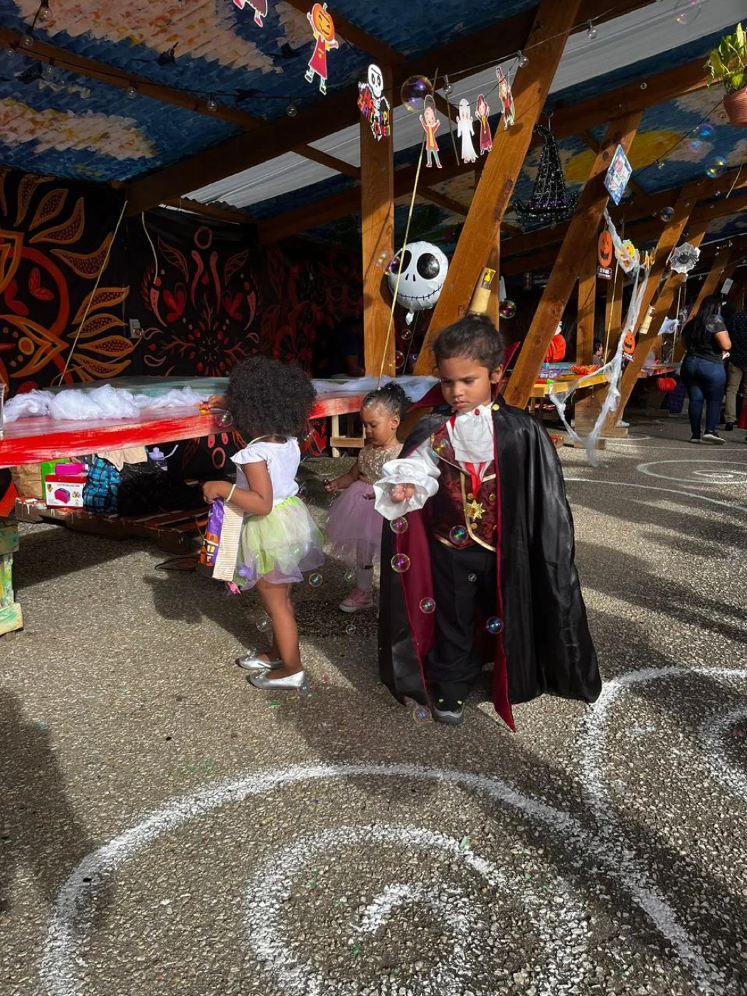 Children enjoying a costume walk at a family event